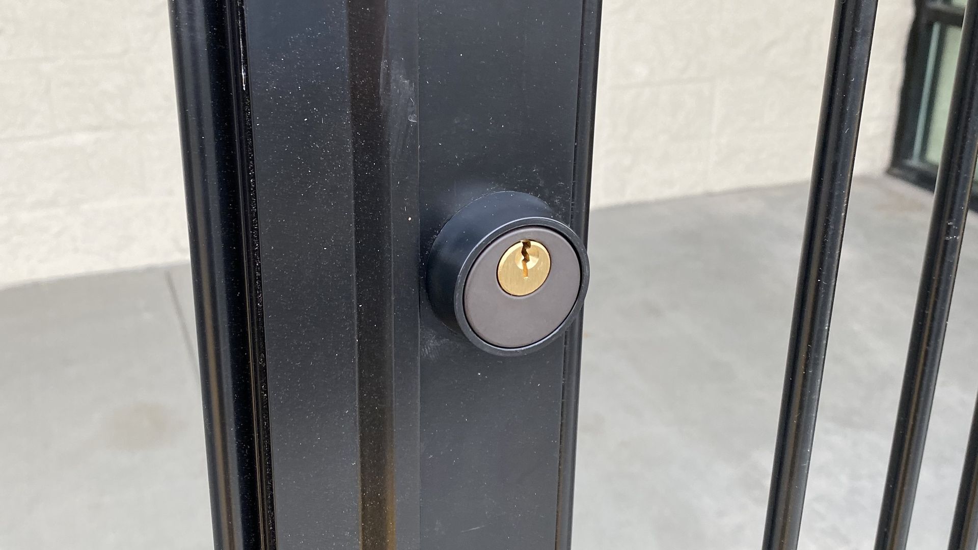 High-security lock cylinder on iron gate