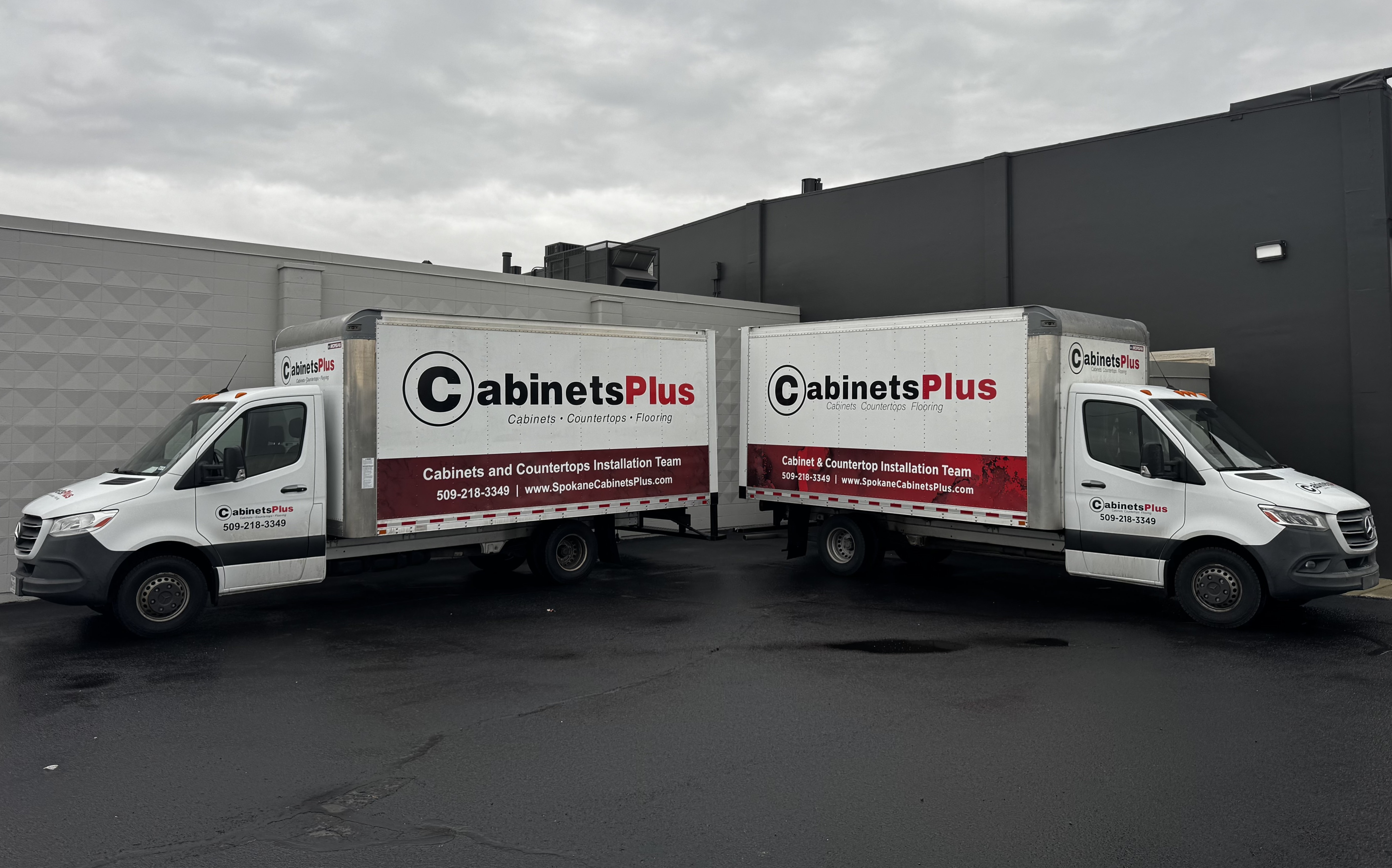 Spokane Cabinets Plus company trucks with branded wraps